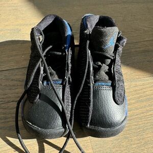 Black and royal blue Jordan’s